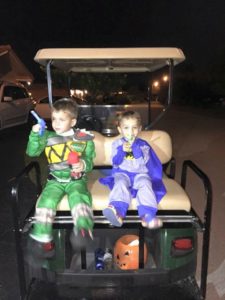 Trick-or-Treating on a golf cart is typical in our community.