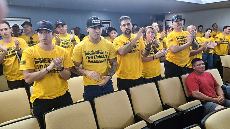 Margate Fire Fighter cheer in favor of merging with BSO during a workshop meeting on August 12