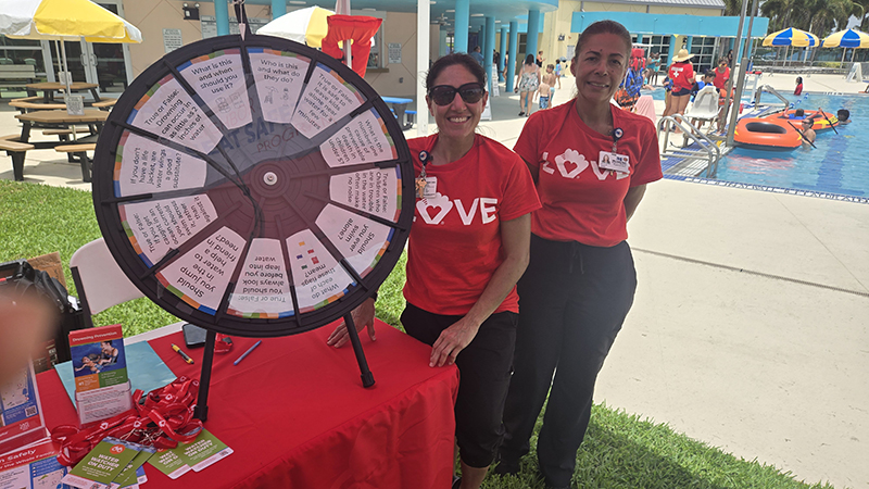 Rachel Solomon and Ana Ristaino of Safe Kids Broward at the safety event at Calypso Cove on June 6