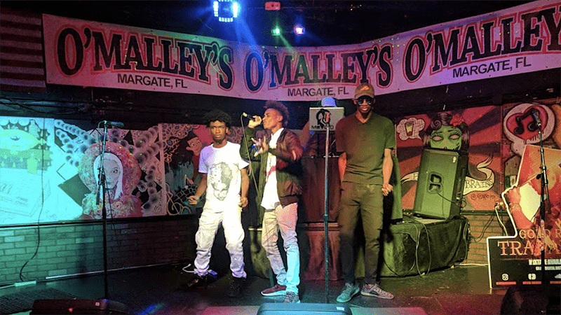 Win $400 at the Annual Christmas Payback Artist Talent Show at O'Malley's